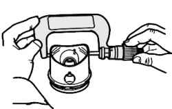 Measure the diameter of the piston