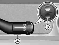 On the steering column switch A key to confirm the menu items and reversible keys in to select