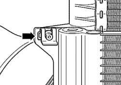 The upper radiator mounting bolts